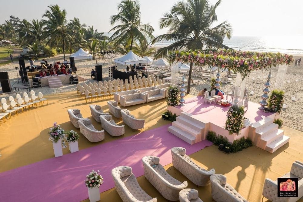 Beach wedding stage and lounge seating