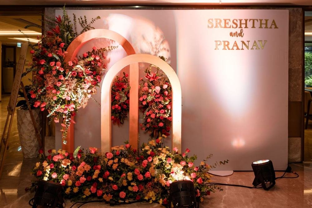 Floral welcome arch backdrop