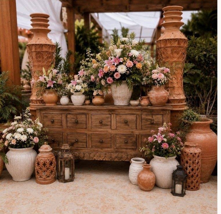 Rustic pottery and floral console