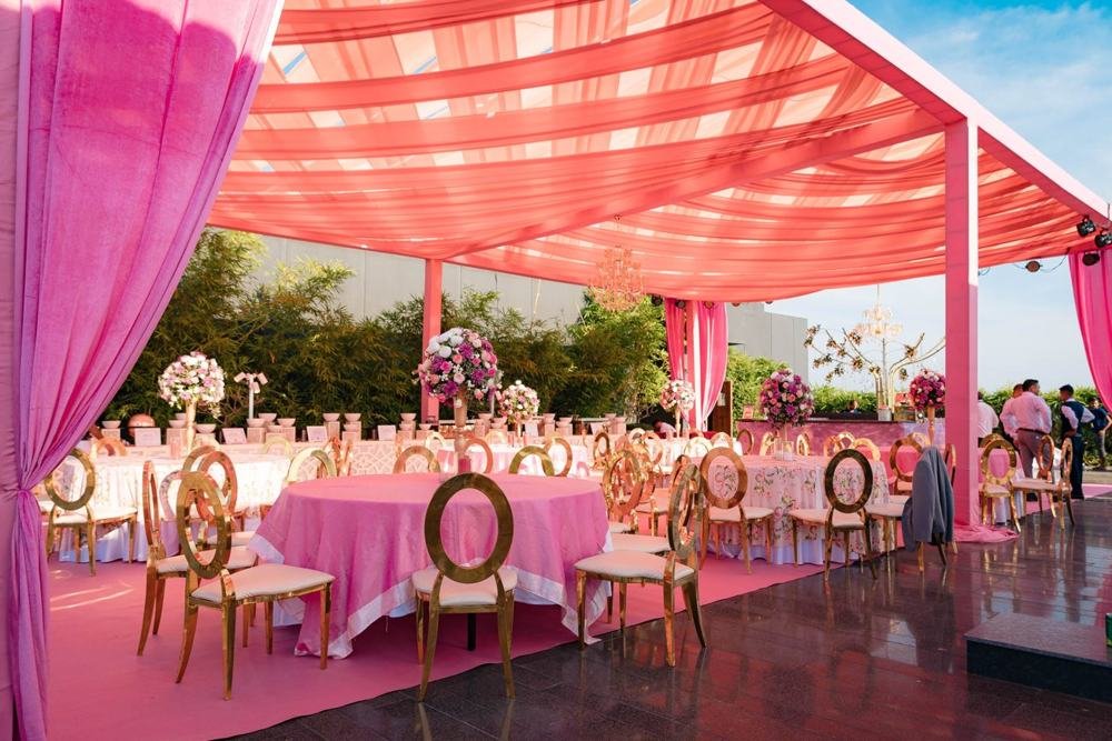 Coral canopy dining setup