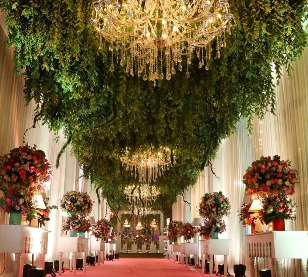 Hanging greenery chandelier walkway